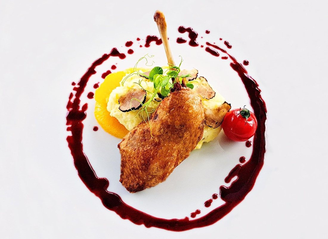 Duck leg confit, truffle mash and orange